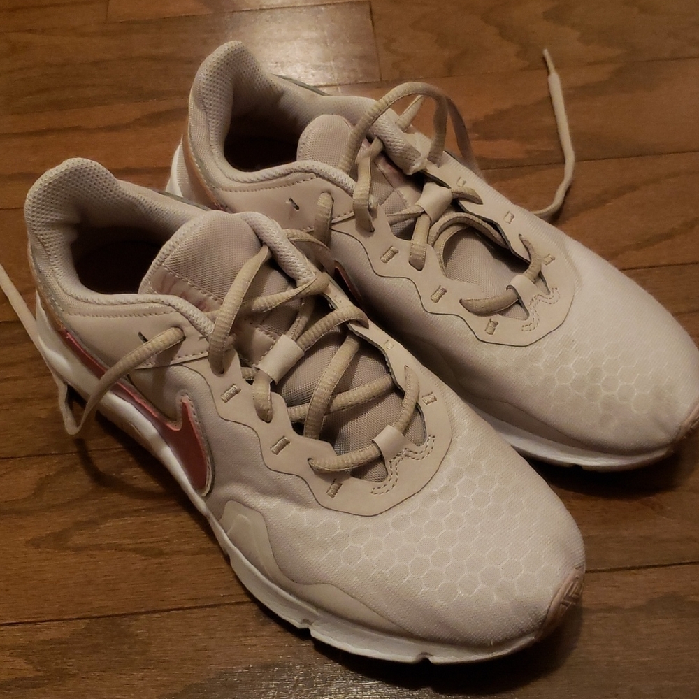 Nike Beige Sneakers with Pink Metallic Swoosh Accent